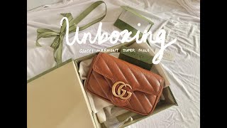 Unboxing  New Gucci Marmont Matelassé Super Mini Bag in Brown Leather [upl. by Atsyrk89]